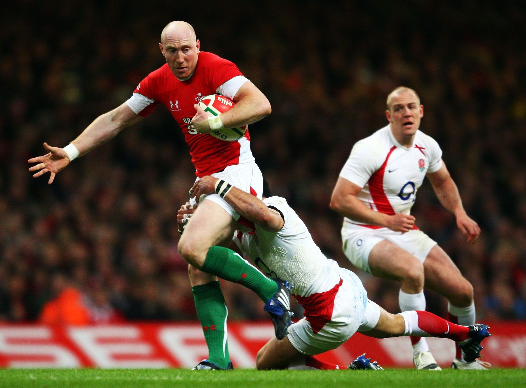 Tom Shanklin playing against England