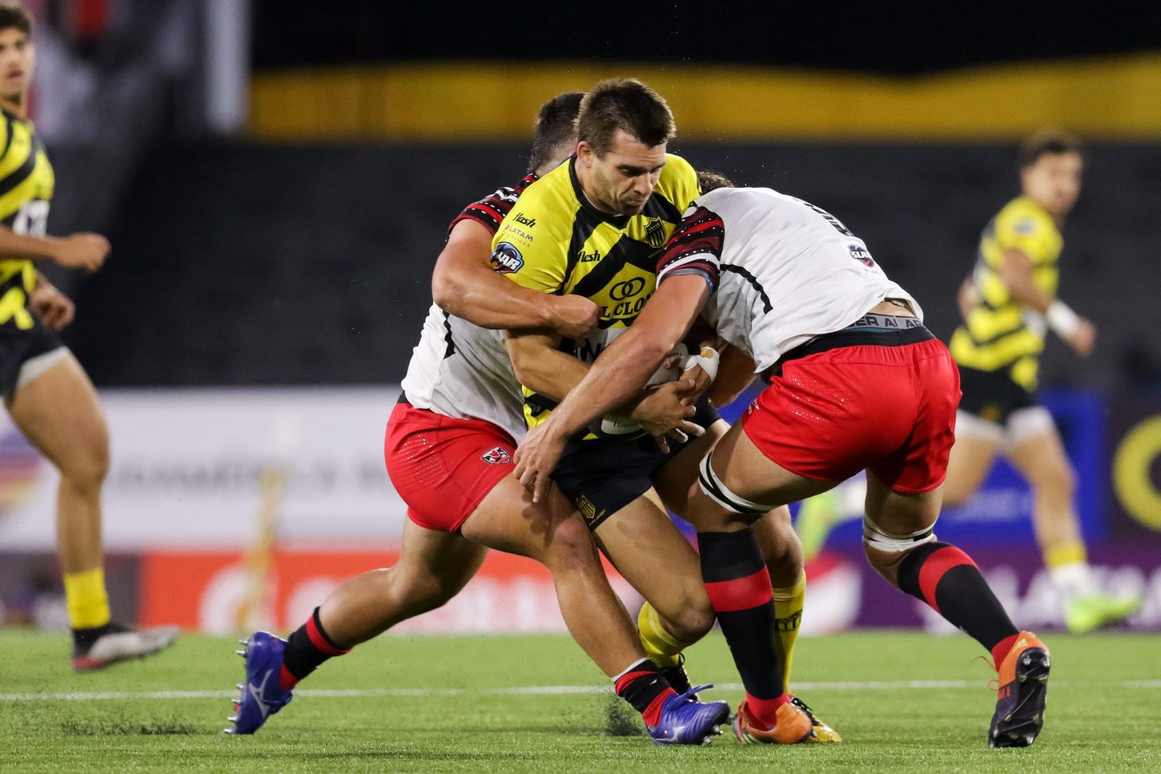 Photo of Andrés Vilaseca being tackled during Selknam v Peñarol Rugby in Superliga Americana de Rugby 2021