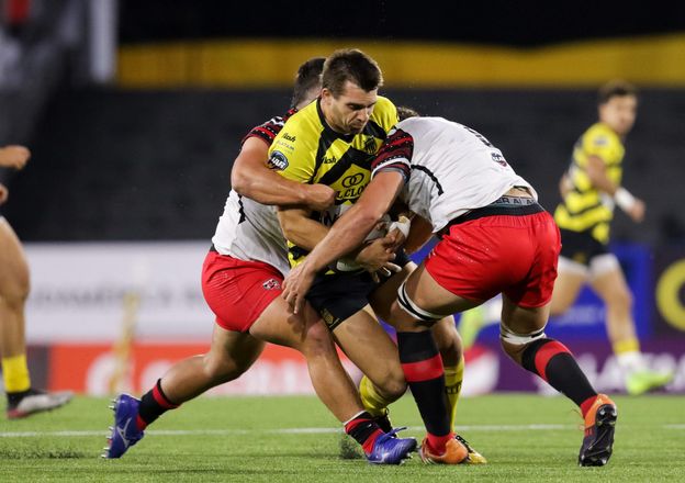 Photo of Andrés Vilaseca being tackled during Selknam v Peñarol Rugby in Superliga Americana de Rugby 2021