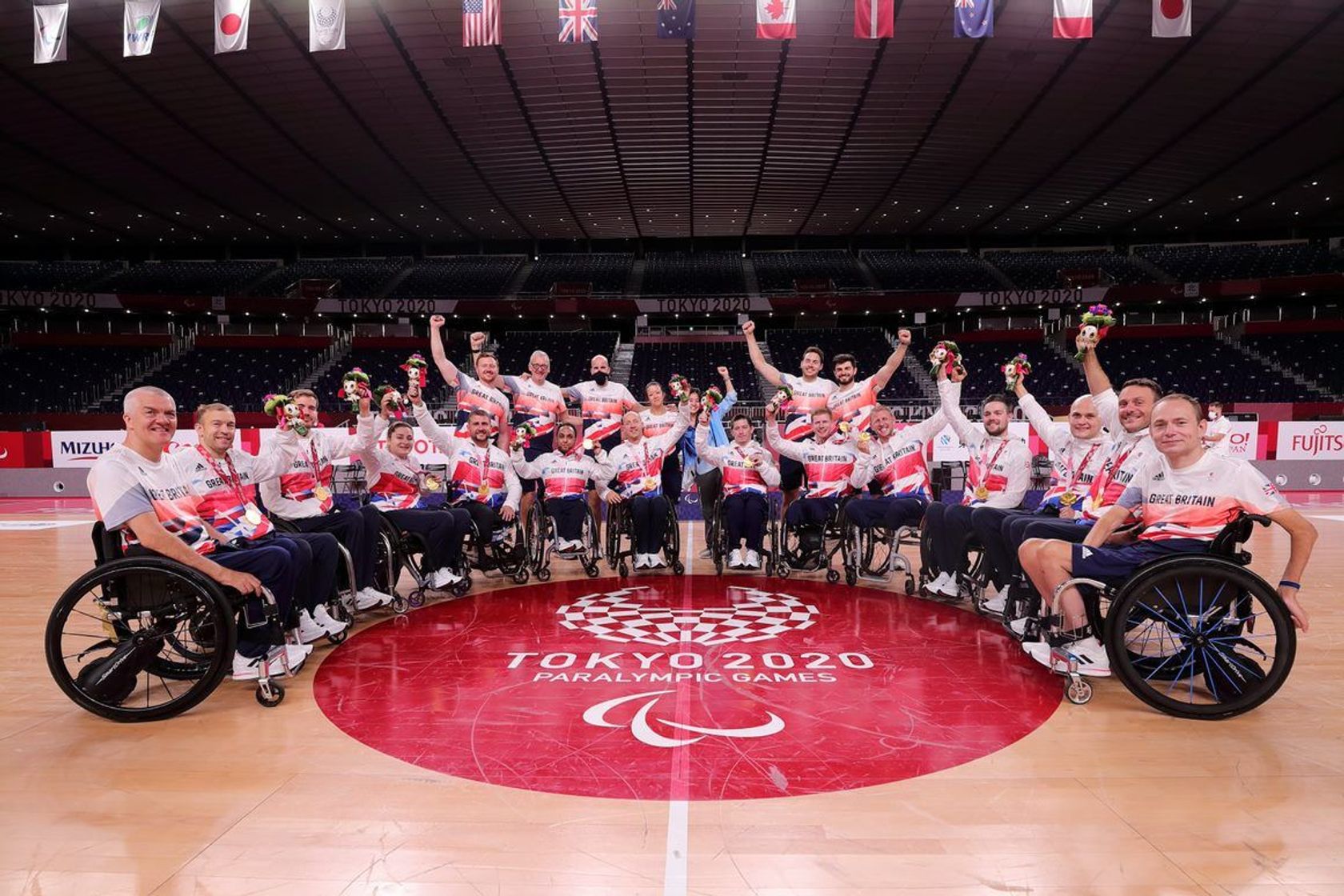 Great Britain rugby wheelchair team celebrate gold medal win v USA at Tokyo Paralympics