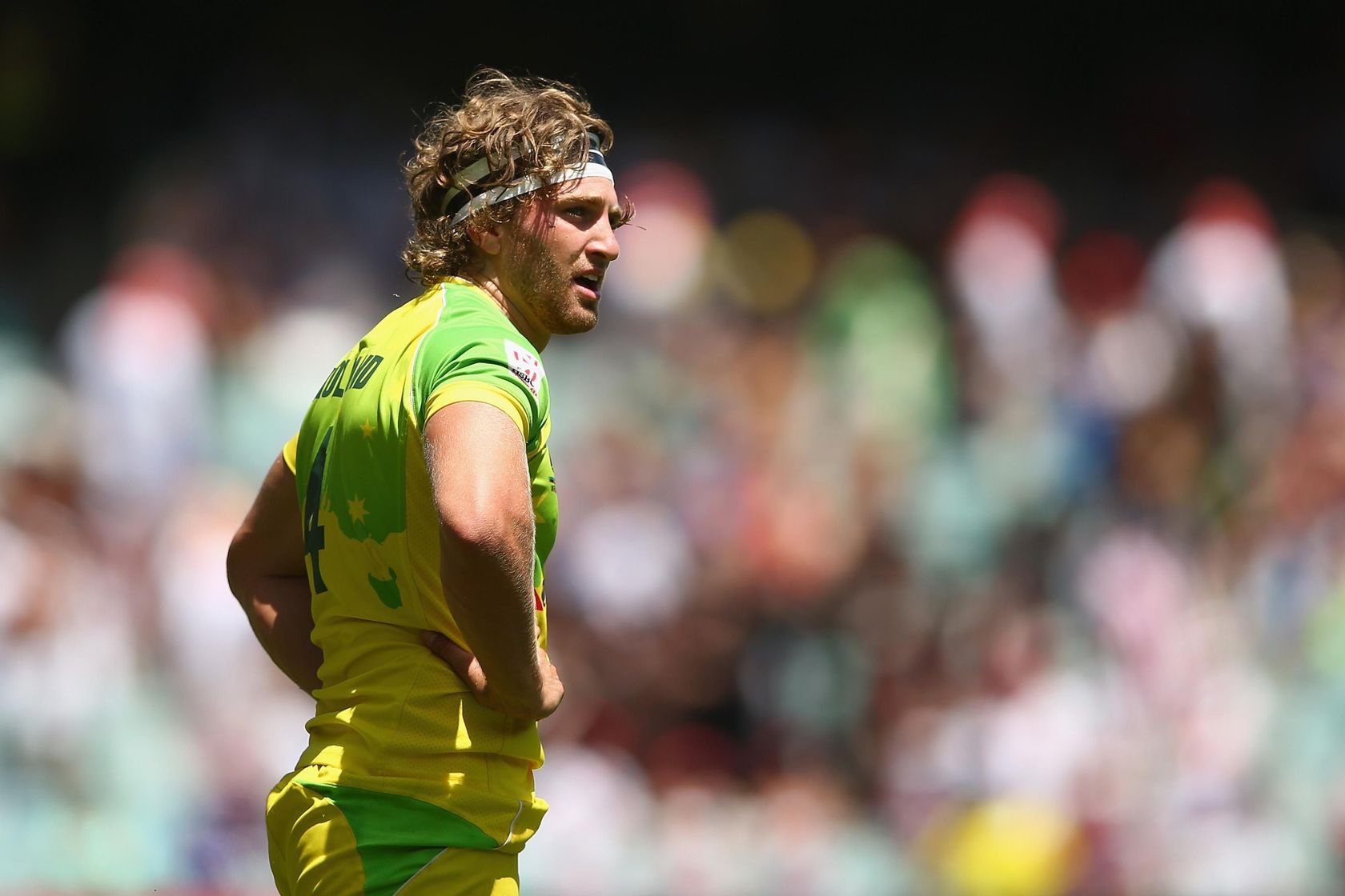 Lewis Holland looks on